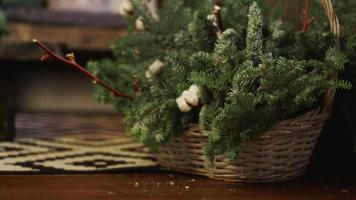 Christmas Card - basket with Christmas tree branches photo