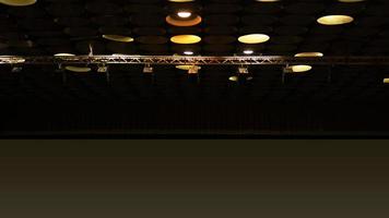 Spot lights in cinema hall on ceiling photo