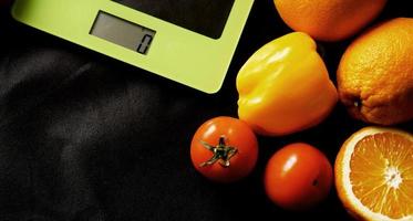 Concept diet. Healthy food, kitchen weight scale photo