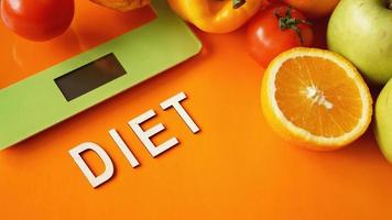 Concept diet. Healthy food, kitchen weight scale photo