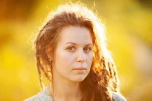 Portrait of a girl with dreadlocks photo