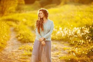 Young woman with dreadlocks photo