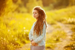 Young woman with dreadlocks photo