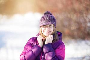 Cute cheerful girl in a cap photo