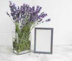 A bouquet of lavender in the interior of a kitchen. photo