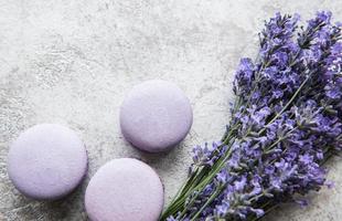 French macarons with lavender flavor and fresh lavender flowers photo