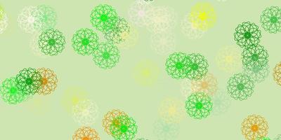 Light green, yellow vector doodle pattern with flowers.