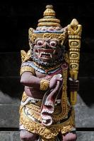 Traditional ancient Balinese Hindu statues in Bali temple Indonesia photo