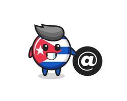 Cartoon Illustration of cuba flag badge standing beside the At symbol vector