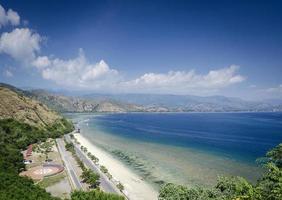 Coast and beach view near Dili in East Timor Leste from Cristo Rei hill monument photo