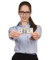 niña sosteniendo un billete de cien dólares foto