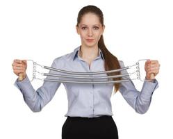 Woman holding a sports metal expander photo