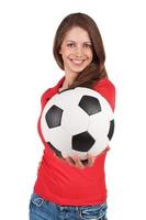 niña con un balón de fútbol en la mano foto