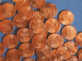 One Cent Dollar coins, United States over blue photo