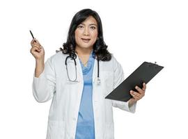 Asian doctor with stethoscope on white background. photo