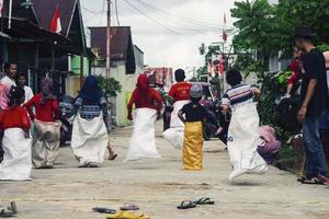 Sorong, Papua, Indonesia 2021- People celebrate Indonesia's independence day with various competitions photo