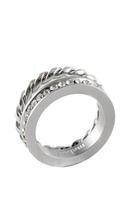 Knotted sparkly twin silver ring with zircons isolated on white photo