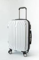 white luggage hat travel journey to destination long weekend holiday photo