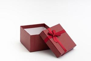 present box with color ribbon on white background photo