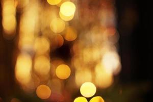 Abstract background of blurred lights with bokeh effect photo