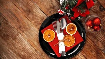 Christmas dinner decoration with dried oranges photo