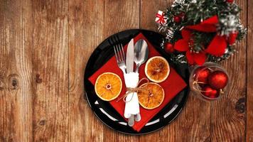 Christmas dinner decoration with dried oranges photo