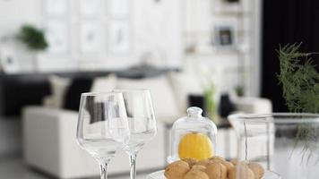 Empty wine glasses on blurred background of modern interior photo