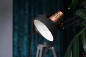 Photo studio lighting equipment on black and blue background