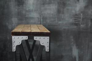 Wooden table with metal inserts. Loft style table photo