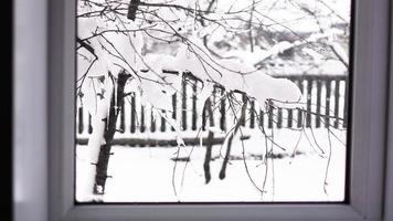 Winter landscape seen through the window photo