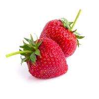 Ripe red strawberry fruits isolated on white background photo