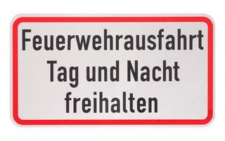 German sign isolated over white. Fire department exit, keep clea