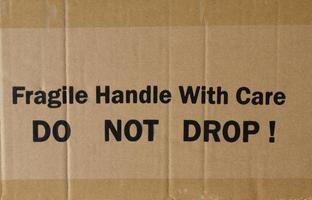 Corrugated cardboard with fragile label photo