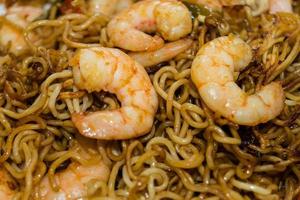 Roasted noodles with shrimps and garlic photo