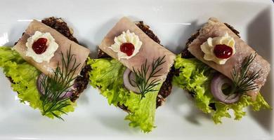 Smoked fish different canapes photo