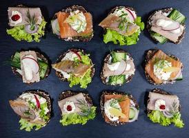 Smoked fish different canapes photo