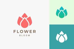 Logotipo de spa o yoga de belleza en logotipo de flor plana y abstracta vector