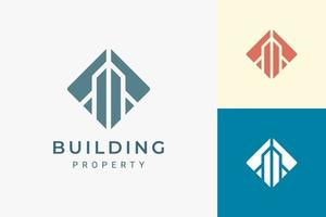 Logotipo de hotel o apartamento en forma de edificio de lujo y abstracto vector