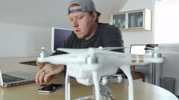 Man in office working with drone
