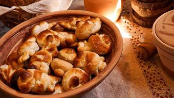 Homemade fresh sweet dough bagels in a basket. Rustic style photo