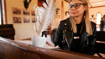 White quill and inkwell in the old university auditorium. photo