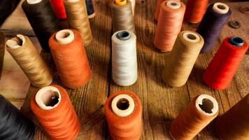 Skeins of thread. Sewing workshop. Multicolored threads photo