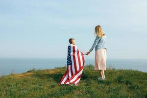 Single mother with son on independence day of USA photo