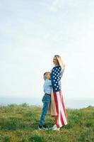 Single mother with son on independence day of USA photo