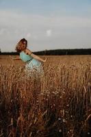 Beautiful Young Woman Dancing In The Field