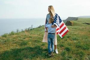 Single mother with son on independence day of USA photo