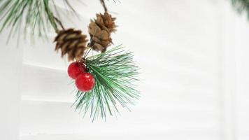 Plastic christmas decor white background. Empty space for your text photo