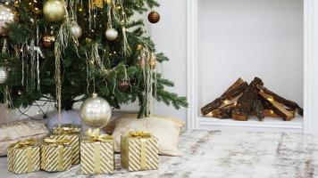 Boxes of presents under the Christmas tree photo