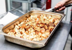 Metal tray with fresh made croutons photo