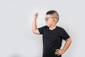 Boy showing his muscle power up photo